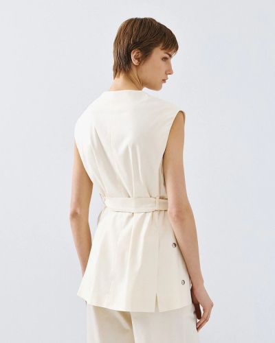 Oversized vest with eyelets - a modern and stylish choice ACCESS FASHION (SKU) 1015